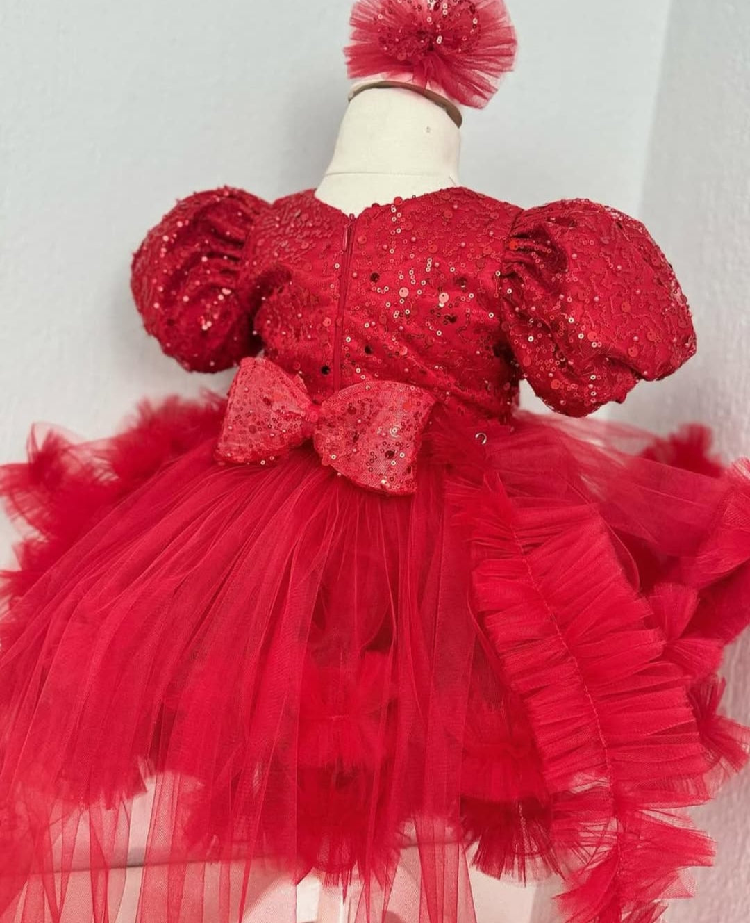 Red Sleeveless And Sequins With Bow Embellished Tailback Frock For Girls